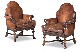 A Pair of Leather Upholstered Armchairs
